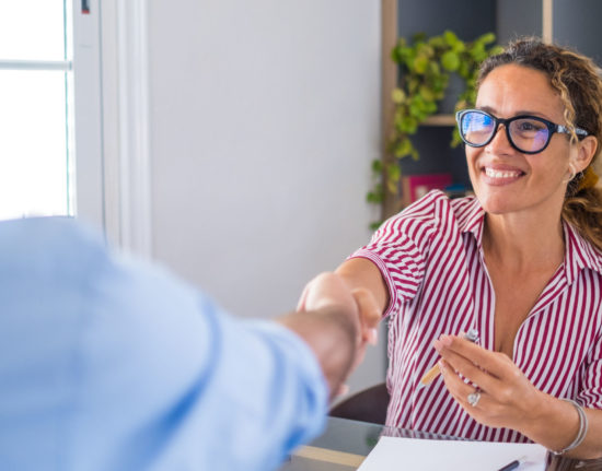 smiling caucasian female hr manager handshake hire 2021 09 02 08 44 13 utc